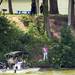 Washtenaw County Sheriff's Office investigators and divers prepare to remove the body. Melanie Maxwell | AnnArbor.com 